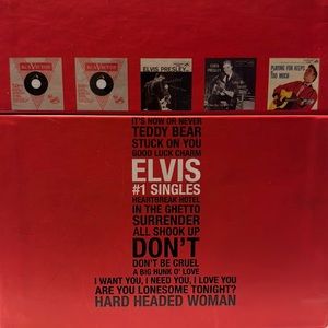 Elvis Presley, NWOT Elvis Presley’s Box of #1 hits on 20 45 RPM Vinyl Records.
